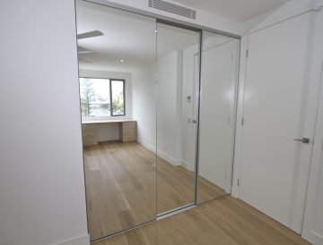 Semi frameless mirror