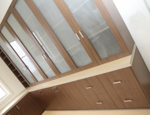 brown office shelves with glass door