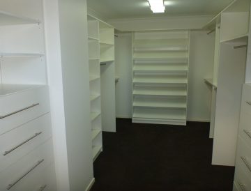 Walk-in Wardrobe white shelving