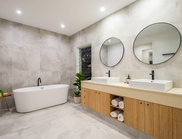 bathroom with double vanity